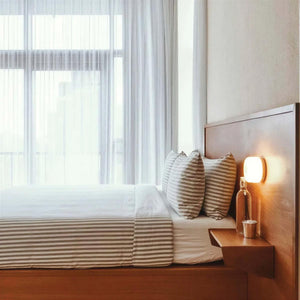 Halo Dimpled Cast Glass Round Wall Sconce