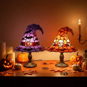 MystiHat stained glass witch hat lamps lit on a table