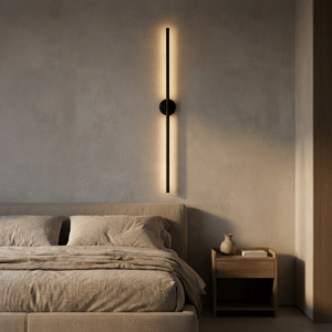 Lune Circular Wall Sconce styled in a minimalist bedroom