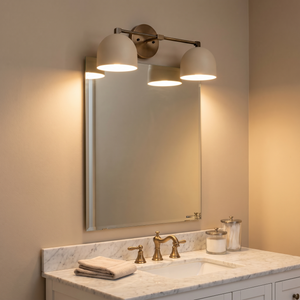 Delane Dome Vanity Wall Light - White/Antique Brass three-quarter angle bathroom
