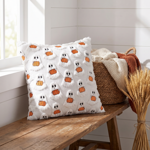 Pumpkin cushion on a wooden bench in a farmhouse entryway
