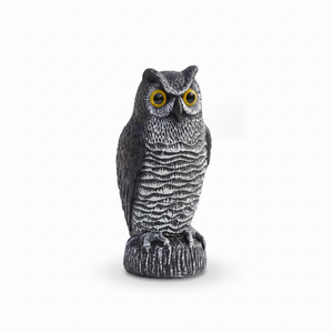 Realistic owl statue on pure white background