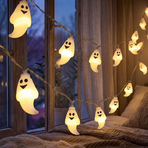 Ghost LED string lights hung across a bedroom window