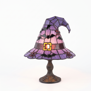 Stained glass witch hat lamp on a white background