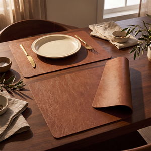 Brown faux leather placemats on a dark wood dining table