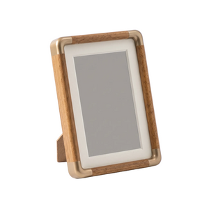 Solid wood tabletop photo frame on a white background