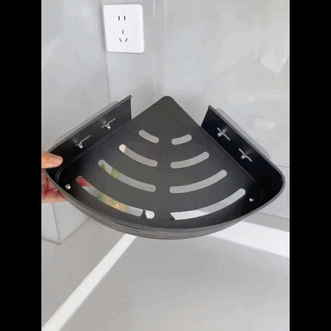 Aluminum corner shower caddy shown in use