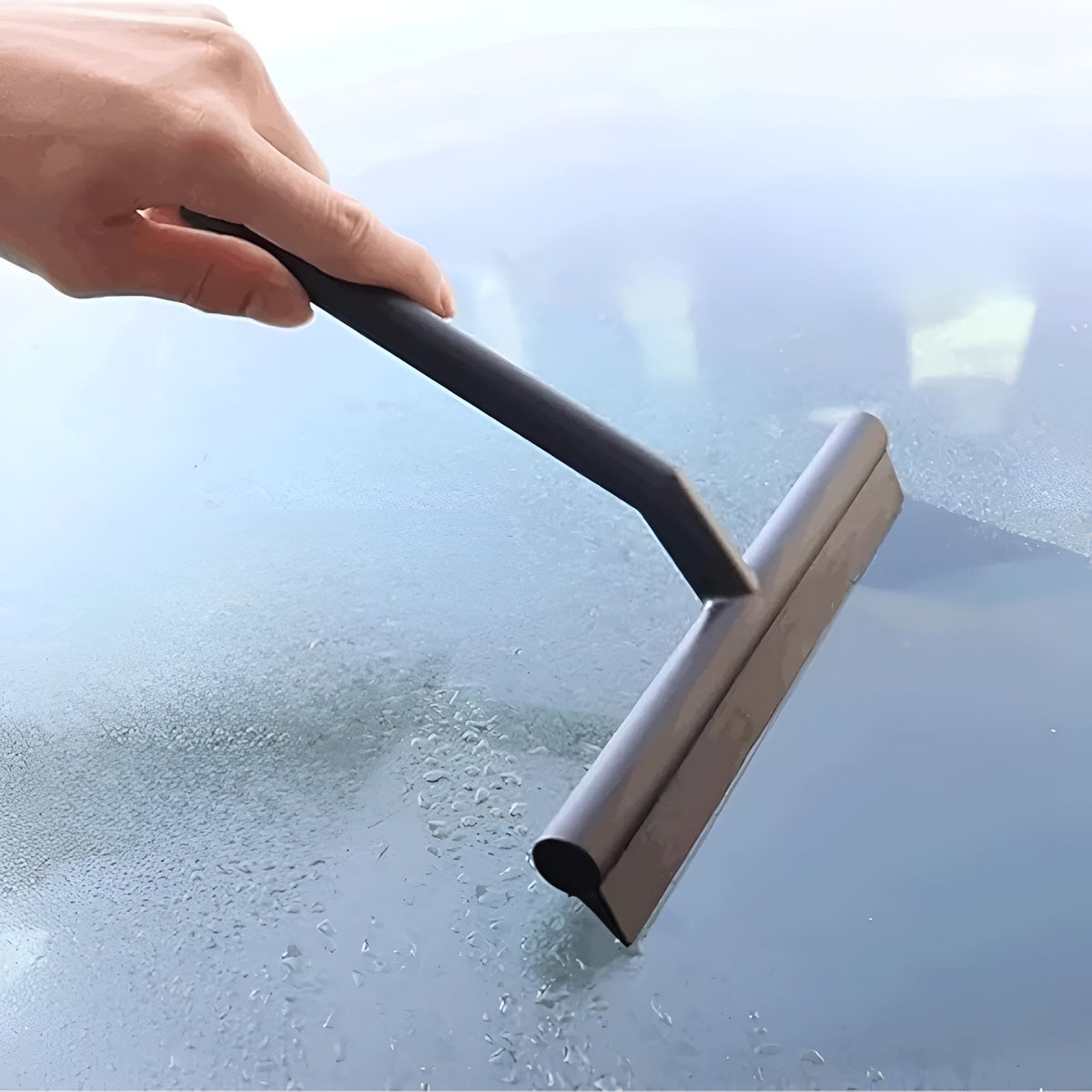 Classic silicone shower squeegee on shower glass