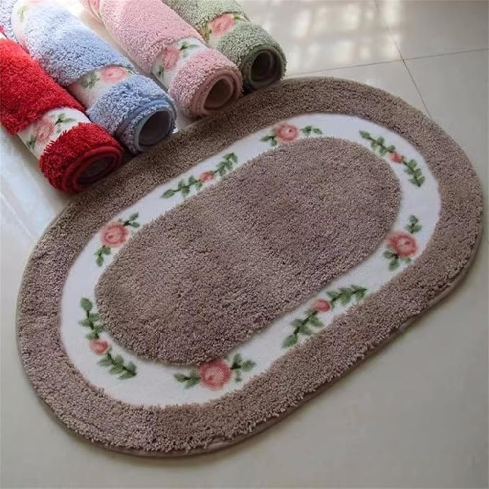 Floral oval plush bath mat shown in a bathroom