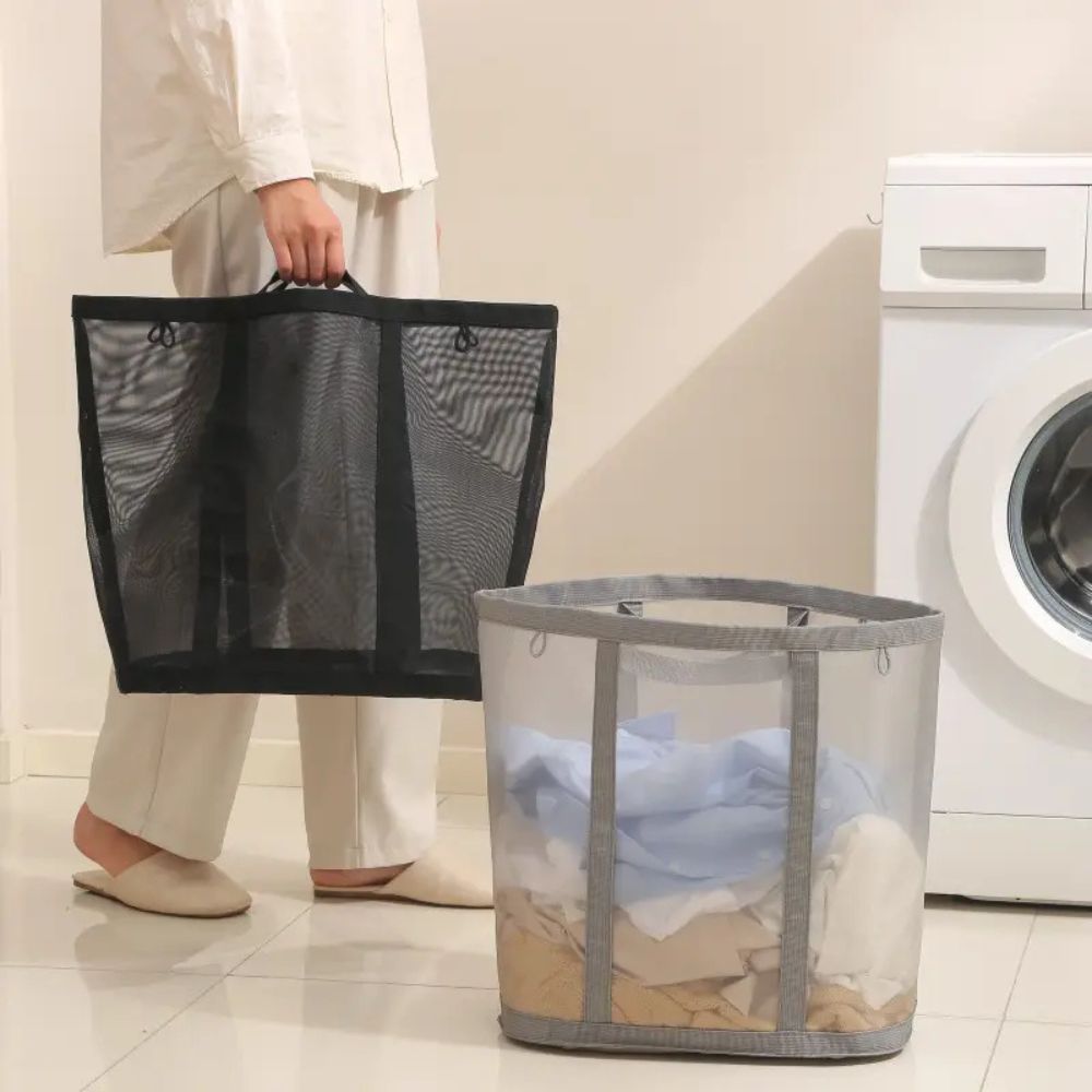 Foldable mesh laundry basket shown in use