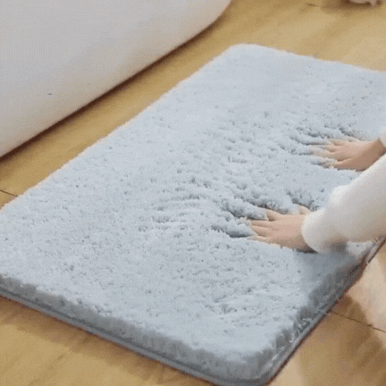 Plush microfiber bath rug in a bathroom