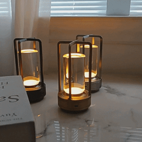 Kaelis crystal lantern lamps glowing on a marble table