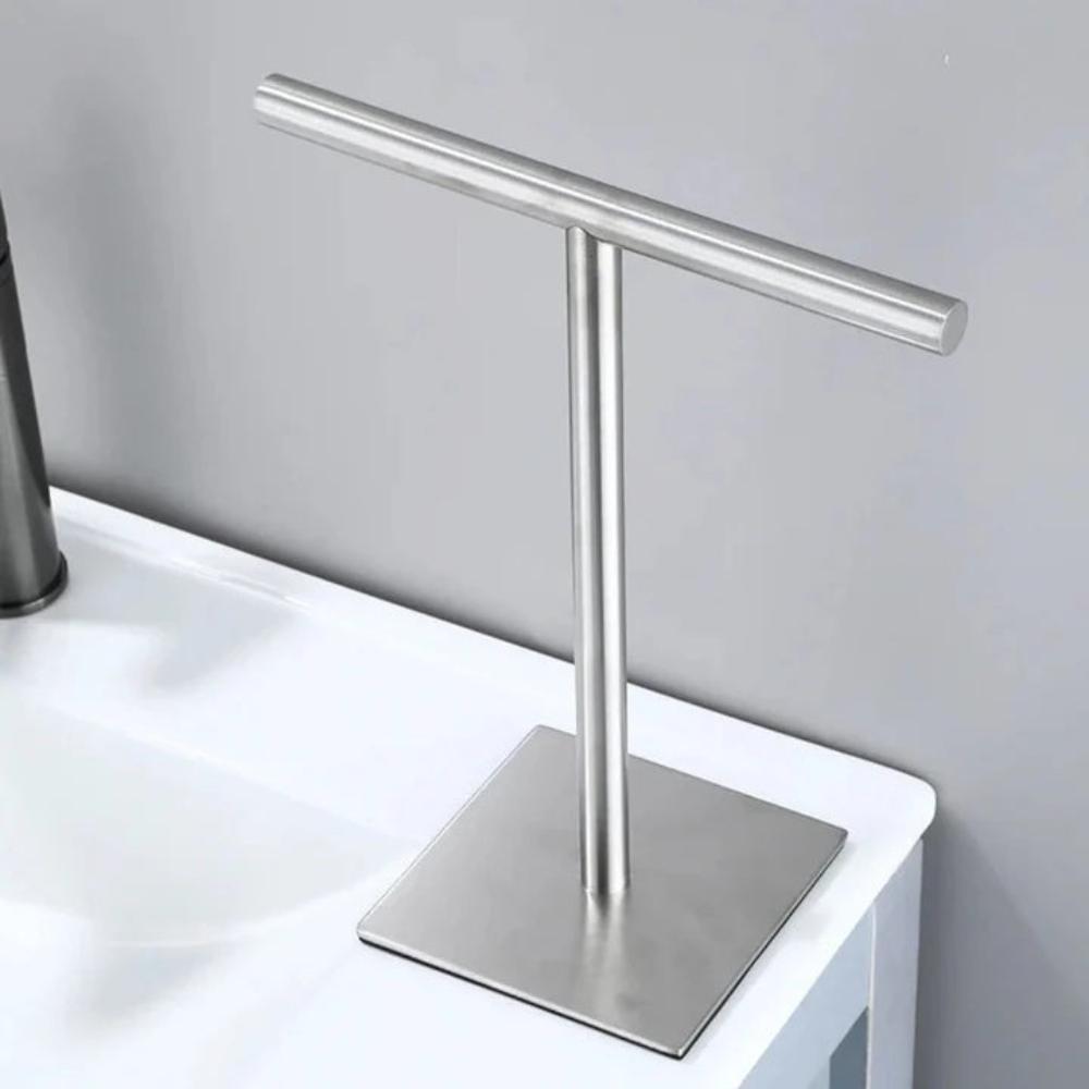 Countertop towel rack holding a hand towel