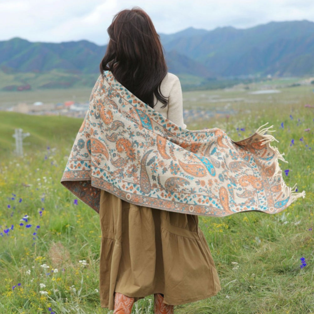 Paisley Elegance winter shawl poncho worn over the shoulders
