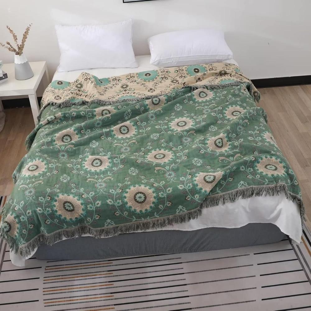 Retro mandala cotton blanket on a bed