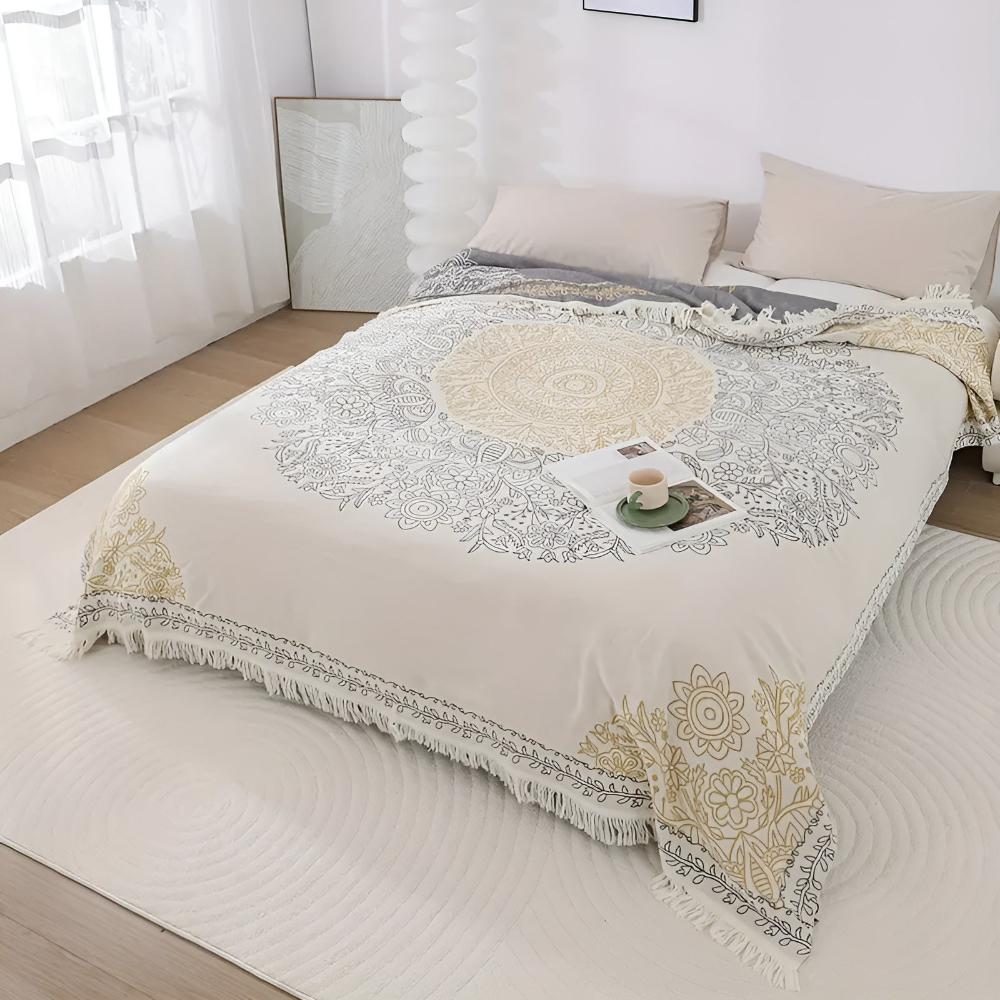 Scandi Chic jacquard cotton blanket on a bed