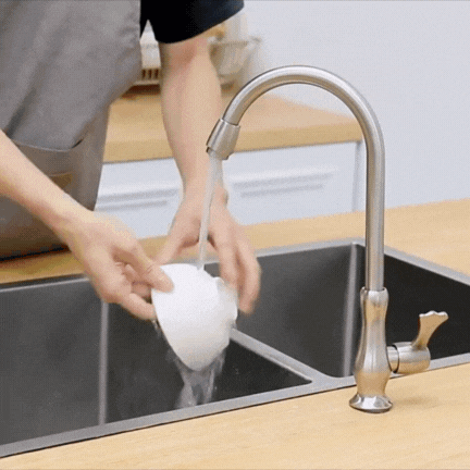 Silicone dish drying mat by a kitchen sink, view 1