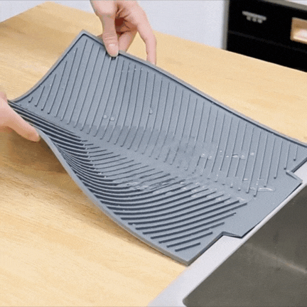 Silicone dish drying mat by a kitchen sink, view 2