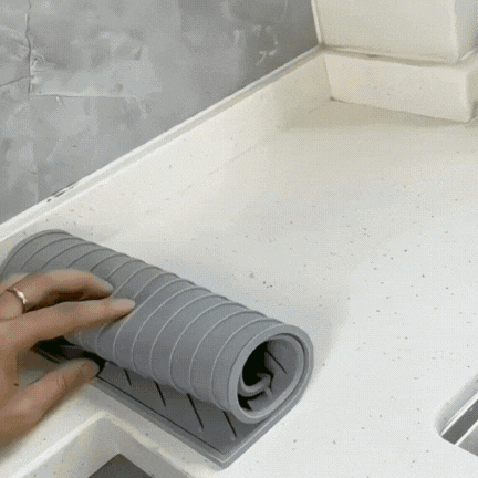 Silicone dish drying mat by a kitchen sink, view 7