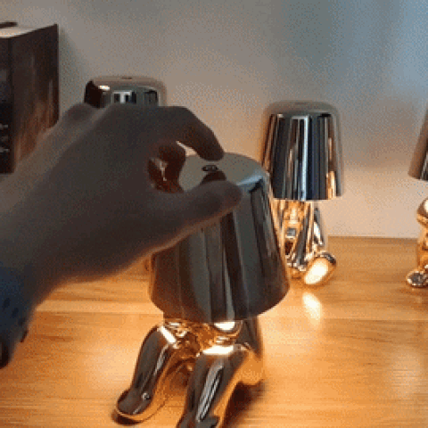 Thinker sculpture table lamp in use at home