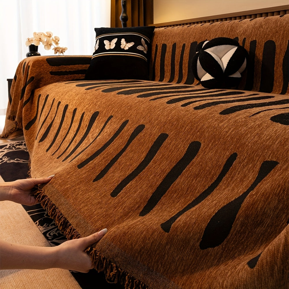 Tribal chenille sofa cover fringe detail